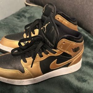 Nike black and gold